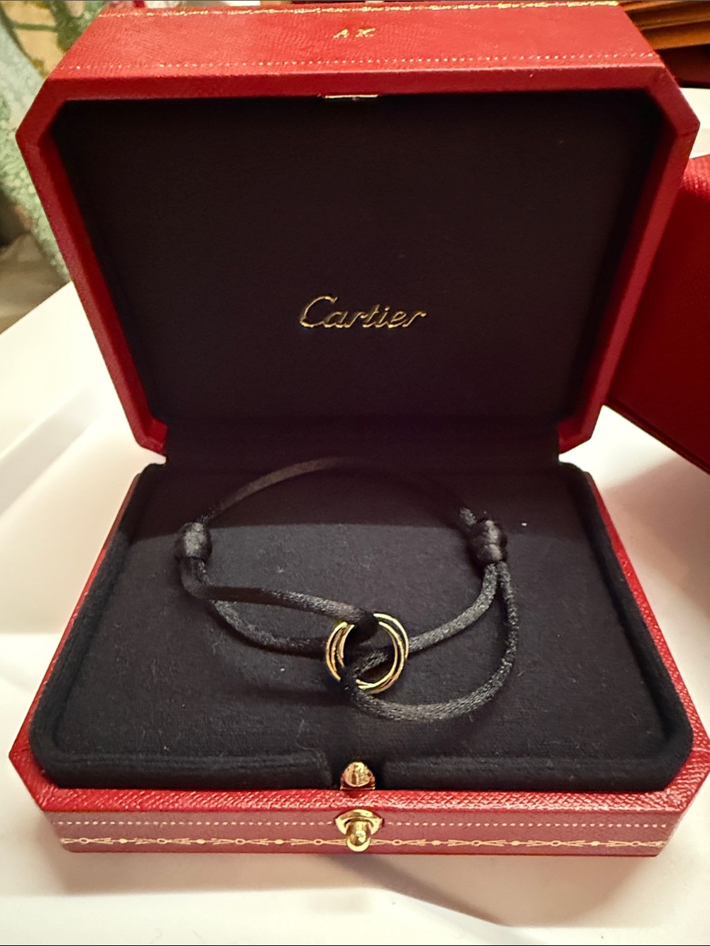 Cartier Black Cord Bracelet with Gold Trinity Rings